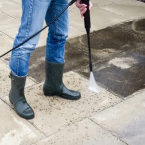 cleaning concrete floor with pressure washing service in cocoa fl