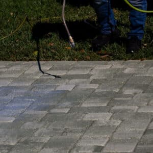 contractor delivering paver sealing service in cocoa fl