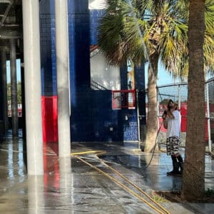 proficient pressure washer cleaning commercial building in cocoa fl