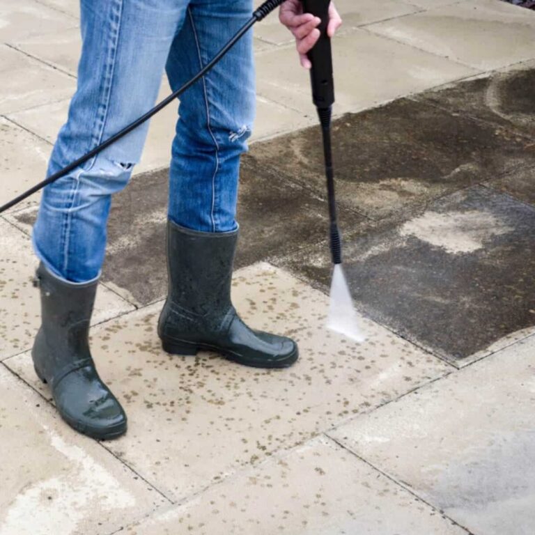 cleaning concrete floor with pressure washing service in west melbournefl