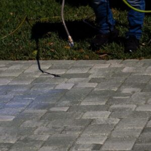 contractor delivering paver sealing service in palm bay fl