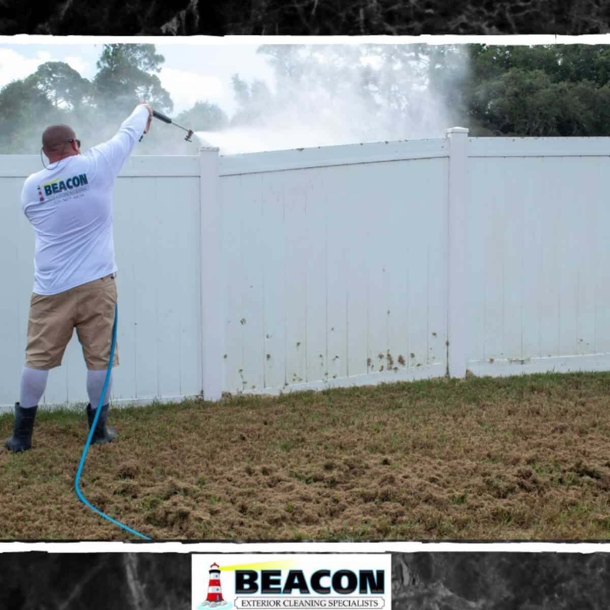 professional house washer cleaning wood fence in palm bay fl